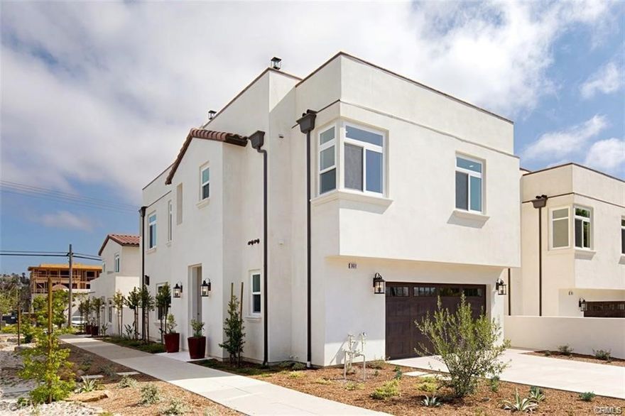 WALK TO EVERYTHING and enjoy OCEAN VIEWS in this GORGEOUS newer construction DANA POINT luxury home with ROOFTOP DECK!  Your new home is just steps away from a scenic lookout point over Dana Point Harbor, and walking distance to restaurants and shopping 

in the iconic Lantern District in downtown Dana Point.  This wonderful home features an open floor plan with beautiful fixtures and finishes.  Enjoy an ocean view from your new primary suite as well as a walk-in closet, dual sinks, a large soaking tub and walk-in shower.  The two secondary bedrooms upstairs also have ensuite baths and there is a bonus room on that same level.  The kitchen boasts sleek European-style cabinets, a huge center island with built-in gas cooktop, and stainless steel appliances, and opens to a living and dining area.  The high ceilings add to the openness and the light and airy feeling.  The living room even features a gas fireplace for those warm and cozy nights.  Your outdoor living areas continue the luxury feeling with a built-in barbecue and fire pit in your backyard, enclosed by evergreen trees for added privacy.  The large rooftop deck showcases spectacular ocean and city lights views.  You will also enjoy your own 2 car garage with 2 car driveway and individual laundry room with washer and dryer included in the lease.  Dana Point Harbor and the local recreation opportunities are fantastic with water sports, boating, paddle-boarding, surfing, hiking, golfing, and more!  Hurry before the special gem is gone!