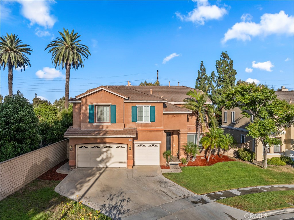 Welcome to 9427 Sun Meadow, a beautifully updated home located in the sought-after gated community of The Hawthornes in Rancho Cucamonga. This spacious residence offers 5 bedrooms and 3 bathrooms, providing plenty of room for families or anyone needing extra space (county records show 3 bedrooms). Recently updated floors grace the main level, creating a modern and inviting atmosphere. Upstairs, brand-new carpeting, including on the stairs, adds comfort and freshness throughout. The master bedroom serves as a private retreat, featuring a large den ideal for an office, sitting area, or home gym. The master suite also includes his and hers closets with custom built-in shelving for enhanced organization. Enjoy relaxing evenings by the fireplace in the primary master bedroom. The downstairs living room boasts a second fireplace and built-in speakers, contributing to a warm and welcoming space for gatherings. Updated light fixtures and window blinds complement the home’s fresh interior, which has been recently painted throughout. Elegant crown molding is featured throughout the entire home, adding sophistication to every room. A premium whole-home water purification system ensures clean, great-tasting water at every tap—ideal for health-conscious living. Situated within a secure gated community with 24/7 security, this home offers peace of mind while being conveniently close to Top Golf Ontario, shopping centers, dining options, and major freeways (10 and 15), providing easy access to the best the area has to offer. Please note: Some listing photos include virtual staging to illustrate the home’s potential. Photos do not reflect the newly installed carpet and fresh paint throughout the home, updated photos coming soon!