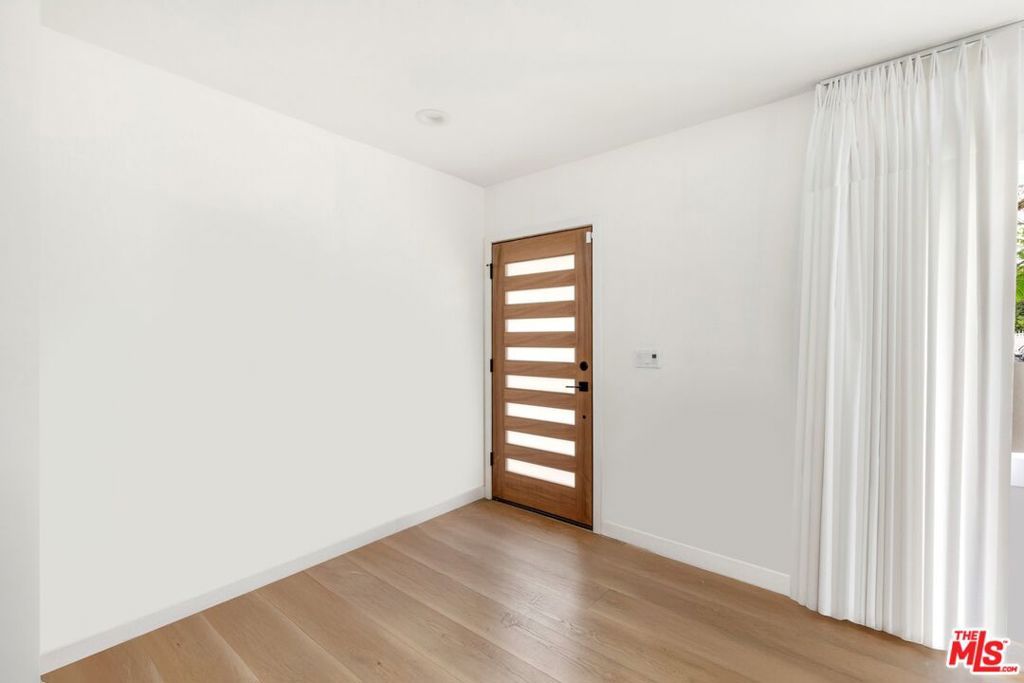 Photo of 4223 Edgehill Drive, Los Angeles, CA 90008 (MLS # 25624211)