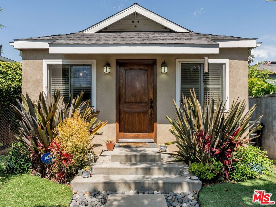 Welcome to your Marina del Rey escape! This delightful 2-bedroom, 2-bath bungalow with detached studio/office space is perfect for those looking for peaceful living without compromising on location, ideally located to everything the Westside has to offer. Step inside to a bright, open-concept living space featuring high ceilings and and skylights that flood the home with natural light. The kitchen is thoughtfully designed with essential appliances, generous counter space, and ample cabinetry perfect for everyday living and entertaining. The primary suite features a private bath, walk-in closet, and French doors that open to a beautifully landscaped backyard- your own secluded haven for relaxing or hosting guests. The detached garage adds valuable versatility, ideal for an art studio, game room, or home office, and includes air conditioning for year-round comfort. Located across from Alla Park and just minutes from Venice, Culver City, and Playa Vista, you'll enjoy quick access to trendy restaurants, theaters, shopping, and more. Move-in ready and designed for easy living, this charming home is a true gem in the vibrant Del Rey neighborhood!