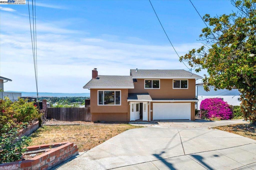 Welcome to your next dream home with multi-million dollar views! Perched in the sought-after Mission San Jose district of Fremont, this stunning tri-level home offers 2,039 sq. ft. of versatile living space, perfect for entertaining and everyday comfort. The home offers the perfect canvas for the next owner to personalize and transform it into something truly spectacular. Enhanced with abundant natural light and recessed lighting throughout, this unique split-level layout provides distinct spaces for living, dining, and relaxing. Offering 3 bedrooms, 2.5 bathrooms, and a spacious versatile bonus room, the home combines functionality with charm. The real showstopper is the deck and backyard area, which has unmatched breathtaking panoramic views of Fremont and the San Francisco Bay, which is especially breathtaking at night when the skyline comes alive. Whether you are cozying up indoors or taking in the scenery outdoors, this hillside gem delivers peaceful vibes and endless potential. Conveniently located near shopping, dining, major commuter routes, schools, and grocery stores, do not miss this opportunity to make this hillside retreat your forever home!