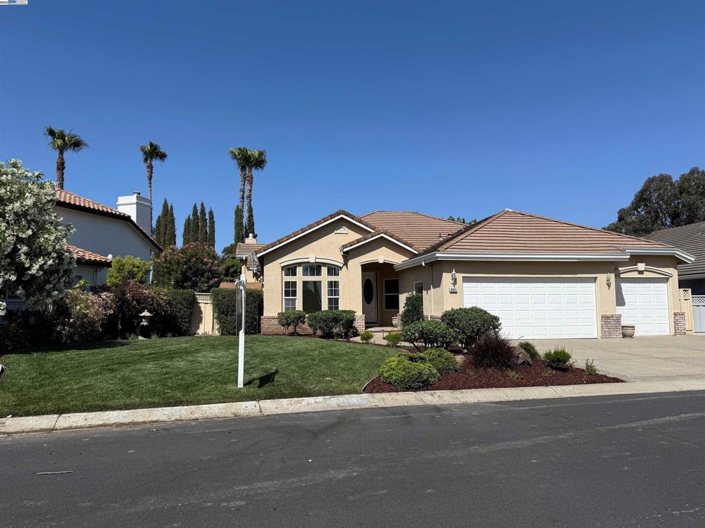 Welcome to beautiful Discovery Bay CC. This quality built home is priced to sell and is waiting for you. It features beautiful landscaping, front and back. Lots of natural light coming in thru the transom windows. It has 3 fill bedrooms plus an office that looks out to the front of the property. The backyard has shade and the Eastern exposure, perfect for evenings outdoors. The home back up to the first green- but far enough away that you have privacy. The 3 fill car garage is finished like the inside of the house.