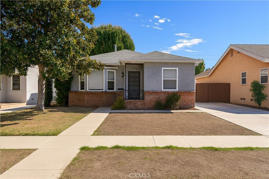 South of Ventura Blvd, this 3 bed, 2 bath home sits in a very desirable neighborhood surrounded by multi million dollar properties. The layout offers good flow: a large kitchen with plenty of room to reconfigure or add storage, a comfortable living area, and a primary bedroom with a balcony that opens to the backyard. Outside, you’ll find a generous, flat lot with a grassy yard, a long gated driveway, and a detached garage, great for parking, storage, or a future workshop. There are lots of opportunities to make it your own with some updates and personal touches. In a prime, inviting location, this home is ideal for buyers looking to live in a top neighborhood for less and willing to do some repairs to bring out its full potential. Come take a look and see the opportunity for yourself.
