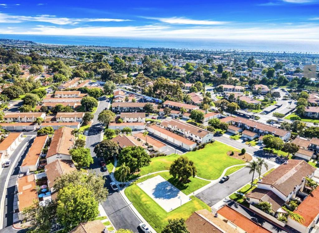 Discover coastal living at its best in this beautifully updated end-unit townhome located in highly sought-after South Carlsbad. Just minutes from Carlsbad State Beach and campgrounds, this residence offers the perfect blend of comfort, convenience, and community amenities. Inside, enjoy fresh new paint and carpet, living room with fireplace, and a sleek kitchen with stainless steel appliances. The home includes air conditioning, a private outdoor living space, and an attached two-car garage for easy access and storage. Families will love the location within the award-winning Pacific Rim Elementary school district. Step outside your door to enjoy exclusive neighborhood amenities including a private pool and spa, tennis courts, and beautifully maintained common areas. With its prime location, resort-style features, and turnkey updates, this home offers the ultimate Carlsbad lifestyle.