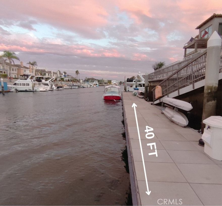 Experience the pinnacle of coastal living in this beautifully appointed 4-bedroom, 3.75-bath residence, ideally located in the highly coveted Regatta section of Spinnaker Bay. Designed with comfort and accessibility in mind, this home features a 1st floor bedroom and ¾ bathroom, making it perfect for guests or multi-generational living.  Enjoy the convenience of a 40-FOOT DEEDED BOAT SLIP directly in front of your home, where you can watch boats drift by while taking in the stunning water views. From the moment you arrive, a meticulously landscaped entry and private elevator set the tone for effortless elegance. Inside, this bright and airy layout features soaring ceilings, refined crown molding in the master suite and main living areas, and expansive windows that flood the space with natural light. The gourmet kitchen is a chef’s dream, equipped with a 6-burner Viking range, built-in refrigerator and dishwasher, and sleek granite countertops—perfect for both everyday living and entertaining. The open floor plan seamlessly flows into the spacious living area, creating the ideal space for hosting friends and family. Step outside to your private waterfront patio, featuring a built-in BBQ, where the serene views and the gentle rhythm of the water create an ideal setting for both relaxation and entertaining. Just beyond your doorstep, discover all that this vibrant community has to offer. Local dining is just a relaxing Duffy ride away, with a wealth of entertainment and shopping options close at hand—including the popular 2nd & PCH, which offers stylish boutiques and eateries such as A PCH, and the scenic waterfront ambiance of Ola. Convenient markets like Gelson’s and Whole Foods Market are also nearby. Continue on to beloved local favorites like Schooner or Later and Boathouse for even more coastal charm. Indulge in fresh produce and artisanal goods at the Farmers Market in Marine Stadium, catch a live performance at the summer band concerts, or get excited for the upcoming Olympics, where thrilling water sports will take place at Marine Stadium. Don’t miss this rare opportunity to live in one of the area’s most sought-after waterfront communities—where luxury, comfort, and coastal charm come together seamlessly.