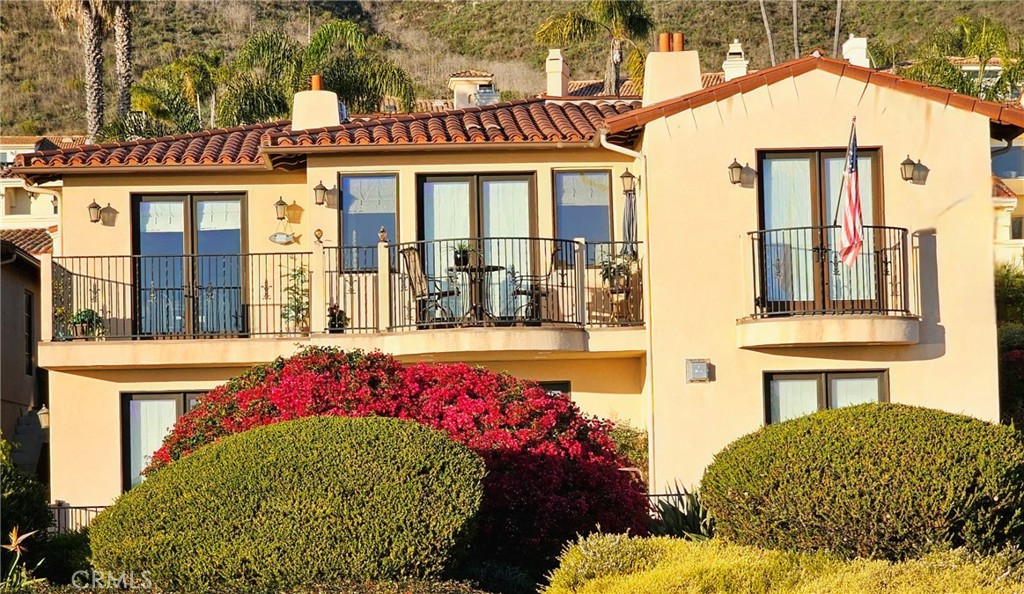 Welcome to Easy Beach Living at its Finest! Beautiful panoramic ocean view home with Accessory Dwelling Unit offers breathtaking point to point vistas of the blue Pacific Ocean and San Luis Bay, making it the perfect spot to enjoy ocean sunsets from most all rooms and decks.
The main level features a luxurious primary suite complete with its own fireplace and a relaxing Jacuzzi tub, cozy balcony, all creating a perfect retreat. In total, the home treasures three gorgeous stone-facia fireplaces, adding warmth and charm throughout its approximate 2,765 square feet of well-designed living space that provides comfort for everyone.
Enjoy three spacious bedrooms plus a versatile granny unit with a private entrance, kitchen, bathroom, and stackable washer/dryer, this home offers incredible flexibility. The accessory unit can serve as a separate living space or the fourth bedroom with its own unique functionality.
An elevator provides convenient access from the main floor to the lower-level hallway, where you'll find additional bedrooms and a laundry room, ensuring ease and accessibility throughout the home. Wide hallways.
The open concept living area is filled with natural light, ideal for both quiet evenings and entertaining friends. The kitchen is a chef's delight, equipped with top-notch appliances and ample cabinet space, a well-designed step-in pantry, and small butler's pantry.
Set on an approximately 8,502 square foot lot, the outdoor area is just as inviting. Enjoy dining under the stars or simply soaking in the fresh ocean breeze in your private oasis. The beautifully landscaped yard enhances the home's charm and provides a peaceful escape.
Other amenities include a Security System and Fire Sprinkler System.
2051 Costa Del Sol is more than just a house: it's a place to call home. Experience the laid-back coastal lifestyle and the stunning ocean and sunset views in this delightful Pismo Beach gem! This golden corridor location offers close proximity to high-end hotels, dining experiences, local shopping, Pismo State Preserve, and easy freeway access to Avila Beach, San Luis Obispo, and southbound towns. Enjoy your privacy with convenience knowing that you are near to join the beach community happenings...all at your fingertips.