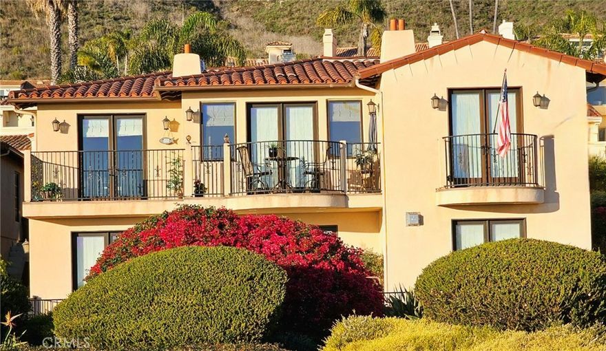 Welcome to Easy Beach Living at its Finest!  Beautiful panoramic ocean view home with Accessory Dwelling Unit offers breathtaking point to point vistas of the blue Pacific Ocean and San Luis Bay, making it the perfect spot to enjoy ocean sunsets from most all rooms and decks.



The main level features a luxurious primary suite complete with its own fireplace and a relaxing Jacuzzi tub, cozy balcony, all creating a perfect retreat. In total, the home treasures three gorgeous stone-facia fireplaces, adding warmth and charm throughout its approximate 2,765 square feet of well-designed living space that provides comfort for everyone.



Enjoy three spacious bedrooms plus a versatile granny unit with a private entrance, kitchen, bathroom, and stackable washer/dryer, this home offers incredible flexibility. The accessory unit can serve as a separate living space or the fourth bedroom with its own unique functionality. 



An elevator provides convenient access from the main floor to the lower-level hallway, where you'll find additional bedrooms and a laundry room, ensuring ease and accessibility throughout the home. Wide hallways.



The open concept living area is filled with natural light, ideal for both quiet evenings and entertaining friends. The kitchen is a chef's delight, equipped with top-notch appliances and ample cabinet space, a well-designed step-in pantry, and small butler's pantry. 



Set on an approximately 8,502 square foot lot, the outdoor area is just as inviting. Enjoy dining under the stars or simply soaking in the fresh ocean breeze in your private oasis. The beautifully landscaped yard enhances the home's charm and provides a peaceful escape.



Other amenities include a Security System and Fire Sprinkler System. 



2051 Costa Del Sol is more than just a house: it's a place to call home. Experience the laid-back coastal lifestyle and the stunning ocean and sunset views in this delightful Pismo Beach gem!  This golden corridor location offers close proximity to high-end hotels, dining experiences, local shopping, Pismo State Preserve, and easy freeway access to Avila Beach, San Luis Obispo, and southbound towns.  Enjoy your privacy with convenience knowing that you are near to join the beach community happenings...all at your fingertips.