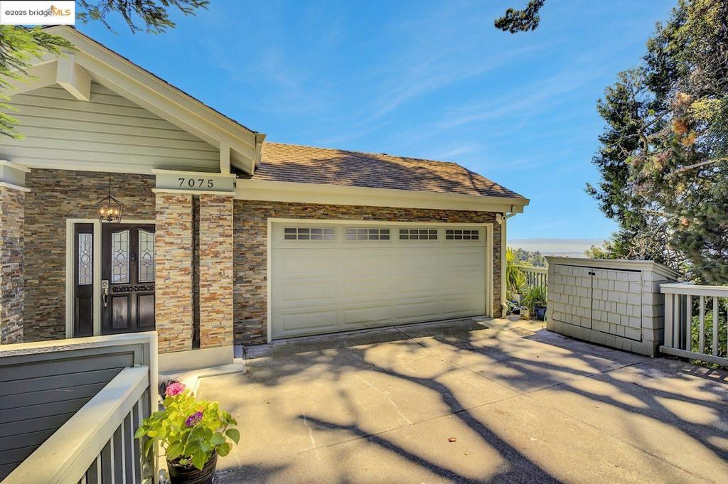 Perched in the Montclair Hills with stunning views of San Francisco, the Bay, and Oakland, this beautifully updated home blends modern comfort with natural serenity. Enjoy a spacious, naturally well-lit, remodeled kitchen featuring a massive center island—perfect for cooking and entertaining. Hardwood floors flow throughout, adding warmth and elegance. The expansive primary suite includes a stylish en-suite bath, while large decks on both levels invite you to relax, sunbathe, or entertain while taking in the views. A two-car attached garage plus two additional off-street spaces offer convenience and flexibility. With over $200K in recent upgrades—including a paid-for solar system—this home is move-in ready. Just minutes from two nearby parks and dozens of scenic hiking trails, it offers the perfect balance of nature and luxury.