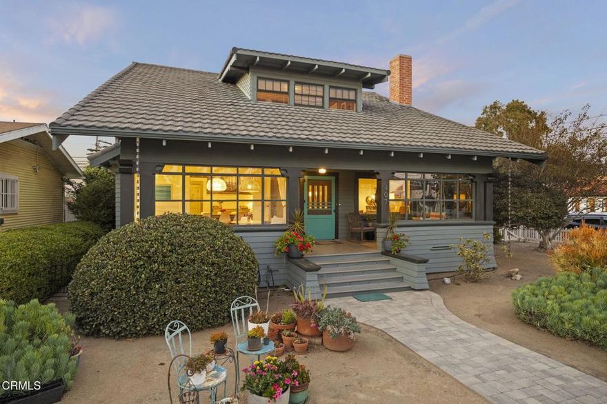 Enjoy the warmth and character of this beautifully remodeled 5-bedroom, 2-bath Craftsman home, perfectly situated on a large corner lot in Oxnard's historic district. Every detail has been thoughtfully restored to honor the home's original 1912 charm, blending classic craftsmanship with modern comfort. Inside, you'll find a bright and open living and dining area filled with natural light and warmth from the original hardwood floors. The remodeled classic kitchen, located in the heart of the home, perfectly captures the spirit of the era while offering modern functionality. Enjoy mornings in the sun-drenched sunroom, ideal for morning coffee, or relaxing in the evening with a good book. Two spacious downstairs bedrooms and a large, period-style bath offer convenience and comfort on the main level. Upstairs, you'll find three more generous bedrooms and another beautifully remodeled bath, each space bathed in natural light and offering ample closet storage. The large enclosed front porch with a swing welcomes you home and invites you to slow down and savor the neighborhood's charm. Outside, a beautifully landscaped yard surrounds the home, with a large backyard perfect for entertaining. A separate garage with alley access adds convenience, while a bonus backyard studio offers endless potential whether as a workshop, gardener's space, or artist's retreat. This home is a rare opportunity to own a piece of Oxnard's history. It has been lovingly restored and is ready for you to create new lasting memories.