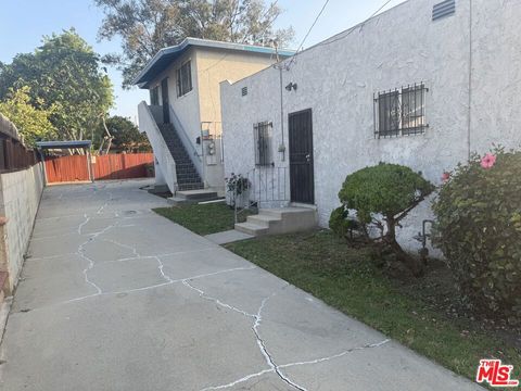 Photo of 1136 W 109th Place, Los Angeles, CA 90044 (MLS # 25547991)