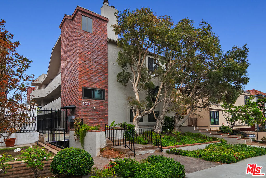 One of Santa Monica's most coveted and highly sought after beloved destinations, is where you'll find, a refined 3 bedroom 3 bath town home + home office/ or family room. Living, and dining area lead to the private patio, ideal for alfresco dining, entertaining, or simply enjoying the fresh coastal breeze less than a mile from the beach. New cooks kitchen with quartz countertop's custom tile backsplash, all new cabinetry, beautifully and tastefully redone. The home has hardwood floors, wood burning fireplace, plantation shutters, crown molding, new sliding glass doors, alarm system, and controlled access entry. Primary suite with patio, walk in closet, along with two more bedrooms upstairs w/3rd bathroom. Laundry room off kitchen with side by side washer/dryer. 2 car parking side by side "NO" tandem parking which is fantastic. Stroll to charming boutiques, award-winning cafes, artisanal coffee shops, and locally loved restaurants that give the neighborhood its vibrant, character. Montana Avenue offers a uniquely relaxed, yet upscale lifestyle that perfectly complements this elegant townhome.