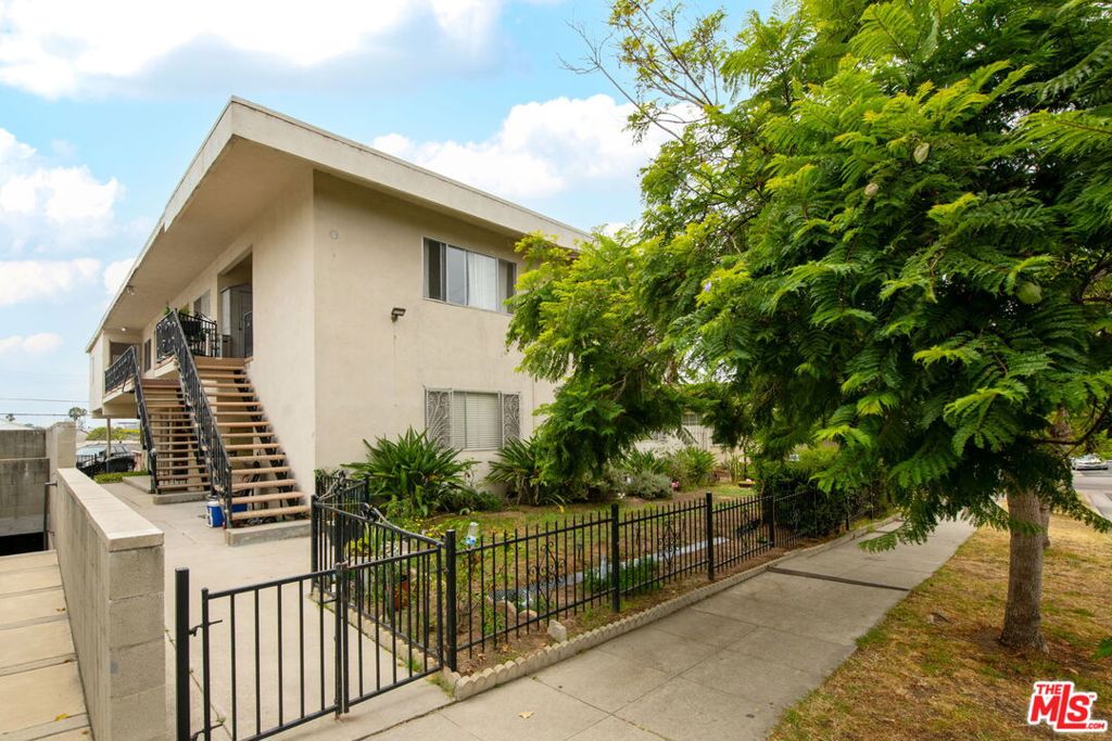 Located just south of Pico Boulevard and north of Olympic, 1810 12th Street offers investors a stabilized, income-producing property in one of Santa Monica's most desirable neighborhoods. This well-maintained 2-story building, built in 1963, features seven units totaling 13 bedrooms and 7 bathrooms across approximately 5,190 square feet of living space on a 7,516 square foot lot. The unit mix includes three 2-bedroom units, one 3-bedroom unit, and three 1-bedroom units. The 3-bed/1-bath unit will be delivered vacant at closing, providing immediate potential for an owner-user or market-rate rental. Current gross annual income is approximately $193,992 with an NOI of $157,010, reflecting a GRM of 12.89 and a cap rate of 6.28%. All units are separately metered for gas and electricity. Parking includes 4 covered carport spaces plus additional uncovered spaces with alley access. Just minutes from the beach, Bergamot Arts District, the Expo Line, and a variety of shopping, dining, and employment hubs, this property presents an exceptional long-term hold or value-add opportunity in a prime Santa Monica location.