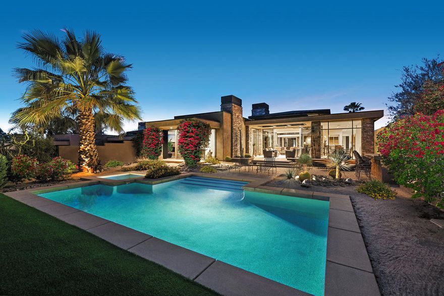 Welcome to your piece of waterfront serenity within BIGHORN Golf Club. This open floor plan with high ceilings, walls of glass and clerestory windows offers stunning views of nature throughout. The great room is open to the kitchen and dining room, making it a terrific use of space for any sized gathering.The master retreat is tastefully furnished, with custom built-in cabinetry, fireplace and direct access to pool, spa and patios. Lovely bathroom with dual vanities, lavs and walk-in closets. Two guest suites inside the home include private bathrooms, closets and access to outdoor patios (one bedroom currently furnished as an office). A separate-entry guest house is accessed from the private courtyard, and features a full bath plus morning bar. Soothing sounds of water surround you as you enjoy the outdoor living of this home, featuring a barbeque center with bar seating, fire pit and generous space for lounging in the sun. Offered furnished.