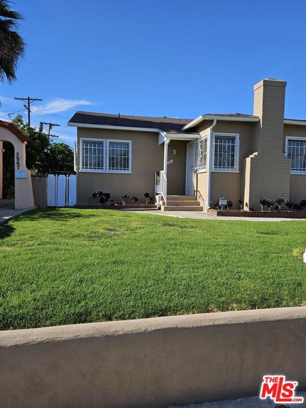 Photo of 3961 W 64th Street, Los Angeles, CA 90043 (MLS # 25563099)
