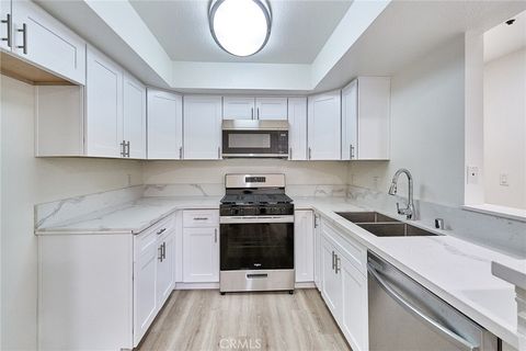 Photo of 345 S Alexandria AVE #212, Los Angeles, CA 90020 (MLS # DW26099627)