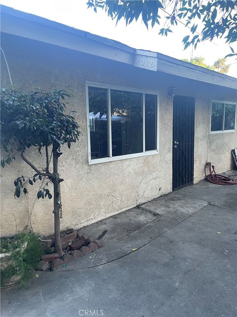 Photo of 7010 Myrrh St, Paramount, CA 90723 (MLS # RS26008455)