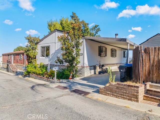 Welcome to this 3-bedroom, 2-bath mobile home located in the tranquil Summit Mobile Home Park in West Hills. Positioned in one of the most desirable areas of the park, this home offers sweeping, unobstructed views of the San Fernando Valley and surrounding mountains — a stunning backdrop to enjoy from your private patio, from sunrise to sunset.
Set in a peaceful hillside location along Woolsey Canyon Road, this home offers a true sense of escape. Far from the noise of the city, it’s the perfect retreat to unwind, reconnect with nature, and enjoy the serenity of birdsong and open skies from your private patio, all while remaining just a short drive from the conveniences of the San Fernando Valley.
Inside, the home features a spacious layout filled with natural light. While it does need some updating, it offers a great opportunity for buyers to customize and transform it into the home of their dreams. The property also includes a covered carport with parking for up to three vehicles — a rare and valuable feature.
The Summit community provides residents with access to excellent amenities, including a recreation center, swimming pool, spa, dry sauna, picnic areas, and RV parking — all within a secure, gated environment.
The seller is motivated, making this a fantastic opportunity to own in one of the most scenic and peaceful mobile home communities in the Valley.
Don’t miss the chance to enjoy hillside living with breathtaking views and endless potential.