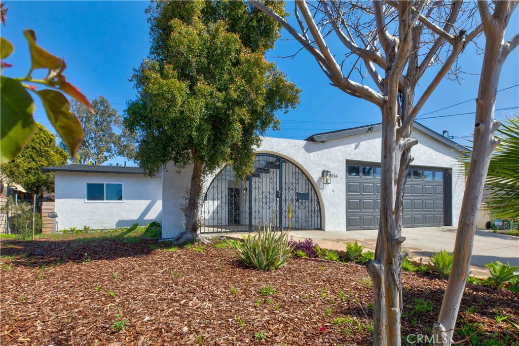Welcome home to 8066 Teesdale Ave. North Hollywood CA 91605! Experience the perfect blend of suburban and city living with this home being located only minutes away from downtown NOHO while enjoying the spacious backyard and front yard, perfect for hosting gatherings. This recently remodeled 3 bedroom, 2 bathroom home has undergone a recent transformation, it also offers an optional 4th bedroom/office. If you are looking for a home with no major renovations needed, this is your home. Only a year ago this home had upgrades such as LVP floors, dual pane windows and sliding door for thermal performance and noise reduction, full tasteful renovation on both bathrooms, recess lights through out the home, Nest thermostat for convince and energy efficiency, garage door motor, tankless water heater, and a brand new roof! The garage has a 240V outlet that can be used for an electric car charger. Approved plans for garage to ADU conversion also included!