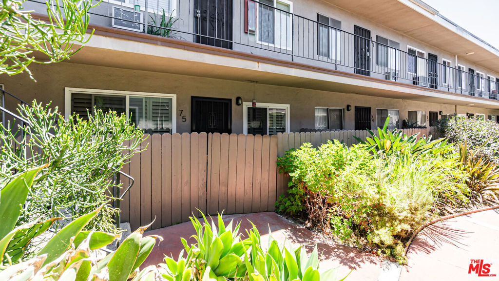 Beautifully Upgraded Condo in North Long Beach Complex! Living room w/ fireplace. Dining area. Kitchen w/ designed cabinetry, quart countertops, tiled backsplash, & stainless-steel appliances. Spacious bedroom w/ ceiling fan & large closet. All windows have shutters for privacy. Enclosed front courtyard. Washer & dryer in unit. One dedicated parking space in secured garage. Community amenities include 2 swimming pools. Easy freeway access & just minutes to the best shopping, dining, & entertainment the area has to offer. Turnkey!