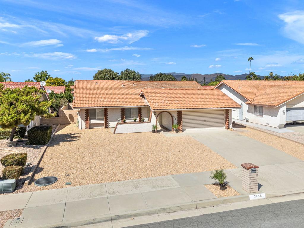 Adorable Home in the Desirable 55+ Seven Hills Community - HemetThis beautifully remodeled charmer features 3 bedrooms and 2 bathrooms in an ideal single-level floor plan, perfectly situated in a quiet and welcoming neighborhood. With its inviting brickwork exterior and ultimate curb appeal, this home is sure to impress from the moment you arrive.Step through the grand entryway into bright and open living spaces designed for both comfort and convenience. The chef's kitchen offers plenty of room to cook and entertain, complete with an additional living area just off the kitchen that's perfect for casual gatherings or seamless indoor-outdoor living. All three bedrooms are comfortable proportionally sized.The spacious living room with fireplace and wet bar is ideal for relaxing or hosting with ease. The open-concept layout provides a modern flow, creating an inviting environment for today's lifestyle.Recent upgrades include:-New recessed LED lighting-Uniform tile flooring throughout-Smooth ceilings-Modern fixtures and ceiling fans-Fresh interior paintThe affordable HOA fee is just $45 per year, and the low-maintenance exterior hardscape makes upkeep a breeze. As a resident, you'll enjoy access to a community pool, spa, and nearby golf course, giving you endless opportunities to enjoy the Southern California lifestyle.This home is priced to sell--don't miss the chance to make it yours and start living your best life at Seven Hills!