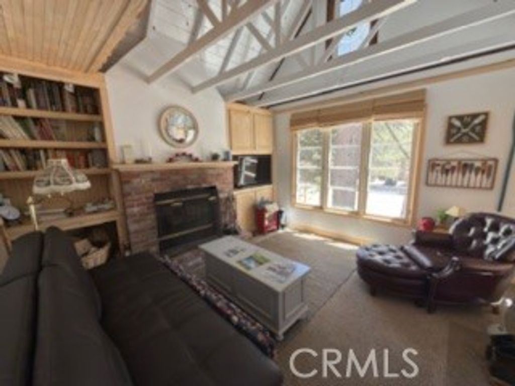 Photo of 658 Yukon Dr, Green Valley Lake, CA 92341 (MLS # IV26085064)