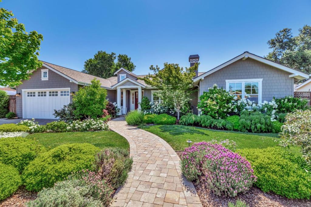 Discover your dream home in North Los Altos with this 4 bed, 3.5 bath custom-built residence. Constructed in 2017 with many design features , this luxurious home offers a prime location close to downtown and top-rated schools. The spacious family kitchen features a large central island, marble countertops, high-end appliances, a breakfast nook with a sitting bench, skylights, and a butler's pantry with a wine fridge. The family room boasts vaulted ceilings, a marble fireplace, a built-in entertainment cabinetry, French doors open to a professionally landscaped backyard. Elegant interiors include hardwood floors, high ceilings, skylights, a formal dining room, and a cozy living room with a marble fireplace, built-in bookcase. The master suite offers French doors to the backyard, a walk-in closet, and an en-suite bathroom with a luxury tub and shower. Additional bedrooms include a guest suite and two bedrooms with a Jack and Jill bathroom. The home with plenty of sunlight and bright morning exposure. Outdoor living features a landscaped backyard, cottage-style garden, and custom-designed pergola. Central A/C, a functional laundry room, EV charger, attached two-car garage with attic storage. Enjoy close proximity to shopping, entertainment, and major Silicon Valley tech companies.