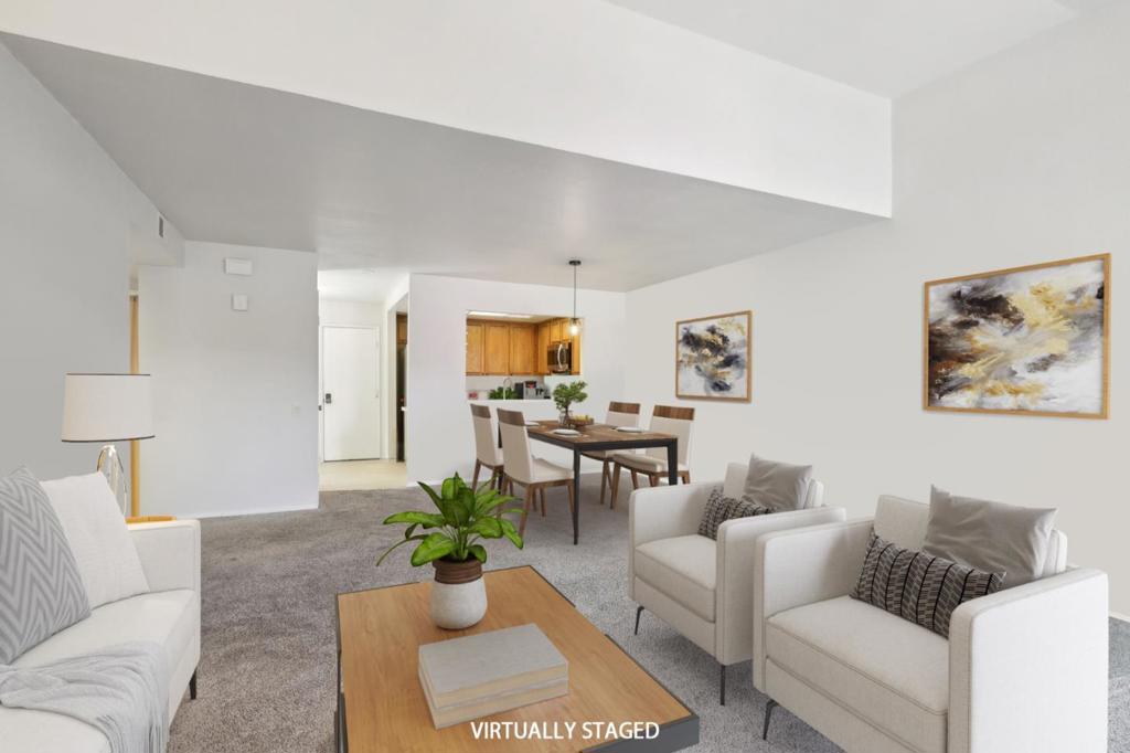 Welcome home to 2378 Cheshire Place in San Leandros Sandpiper Community. This spacious 3 bedroom 2.5 bath townhouse offers 1,723 square feet of comfortable living. Soaring ceilings, large stairway windows, and a floor to ceiling wood burning fireplace create a warm and inviting atmosphere. The kitchen is designed for everyday living with quartz countertops, stainless steel appliances, and a sunny breakfast nook. A flexible downstairs den makes the perfect playroom, guest room, or home office. Upstairs, the primary suite includes a Jack and Jill bath, wall to wall closet, and cozy reading nook. Recent updates include new carpet on the stairs, upstairs hallway, and secondary bedroom. Outdoors, enjoy one of the largest patios in the community, perfect for barbecues, gardening, or entertaining. An attached 2 car garage plus driveway parking for 3 more vehicles provides ample space. Community amenities include a clubhouse, pool, and hot tub. Minutes from BART, Interstate 880, shopping, dining, and parks, and within walking distance of McKinley Elementary and San Leandro High School, this home combines comfort, convenience, and location.