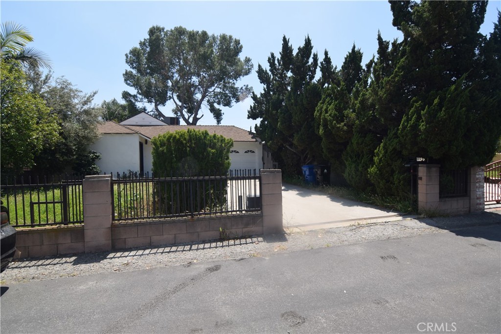 Conveniently located where Sun Valley meets Burbank. Close to the 5 freeway, Burbank airport, shopping and restaurants. The house has been upgraded with new windows, bathroom, laminated flooring, central heating and cooling. The open floor plan is inviting, with a dedicated dining area and two roomy bedrooms. The property has an automated iron gate, which provides security and privacy. Spacious backyard with citrus trees and olive trees in the front yard adds shade and greenery. Lots of potential. Ready to move in.