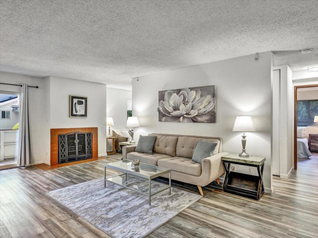 Outstanding remodeled Village Serramonte condo. Two bedrooms, two baths plus den. Spacious light-filled living room with fireplace and dining area that opens into deck. The nicely remodeled kitchen features granite countertops and stainless steel appliances. Both bathrooms have been completely remodeled. Spacious master suite has bathroom with double vanity. Den can be converted into possible 3rd bedroom. Great closet space! Laundry room with washer/dryer. Underground parking space. The Village Serramonte community includes an indoor pool, hot tub, gym, tennis courts. Great convenient location, close to Hwy 280, SFO, BART, Colma and Serramonte shopping and restaurants.