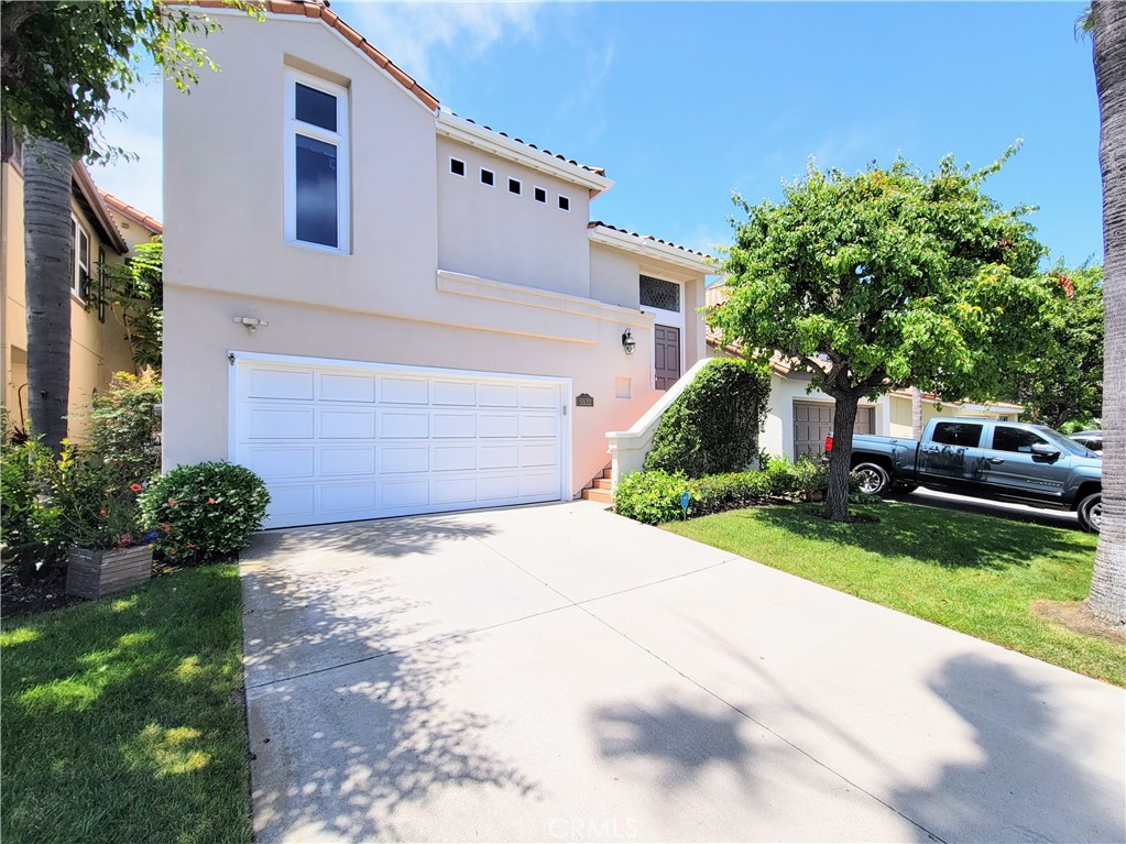 Experience luxury waterfront living in this beautifully upgraded tri-level home located in the highly desirable community of Spinnaker Bay. Enjoy breathtaking, panoramic views of the Long Beach Harbor from nearly every room, along with the convenience of a private 24-foot boat dock.
The dramatic entryway opens to a spacious main living area featuring soaring 15-foot ceilings, expansive windows, and rich laminate flooring throughout. Freshly painted interiors and abundant natural light create a warm and open atmosphere designed to impress.
The gourmet kitchen is a chef’s dream, equipped with a full suite of appliances including a stove, refrigerator, dishwasher, microwave, and a central island perfect for entertaining. A charming window box seat offers a serene harbor view, and the adjacent balcony provides the ideal setting for outdoor dining or relaxing.
The main level also includes a guest bathroom and a luxurious primary suite. The master bedroom features a large walk-in closet with built-in organizers and lighting, and an impressive en-suite bathroom with dual vanity sinks, a soaking tub, a spacious walk-in shower with multiple shower heads, and a private water closet.
The lower level offers a versatile den or secondary living area, two additional bedrooms, a full bathroom, and a laundry room. Sliding glass doors provide direct access to a cozy patio and beautifully landscaped rear yard with continued views of the harbor.
Additional amenities include a large two-car attached garage with an oversized storage area. Don’t miss this rare opportunity to live in one of Long Beach’s most coveted waterfront neighborhoods.