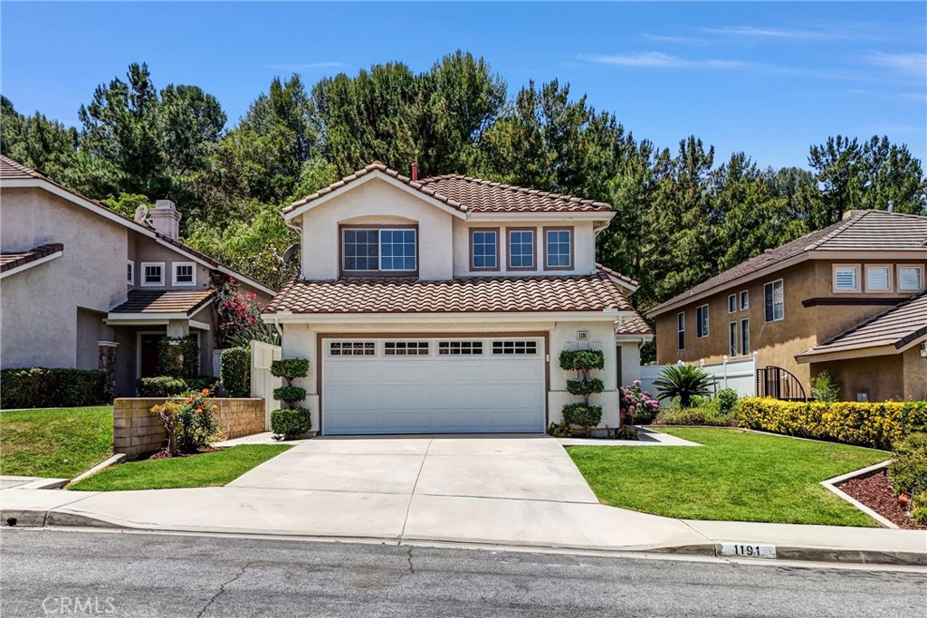 Nestled on a gentle uphill street with landscaped slopes, views of canyons surround and afar, this beautiful 3-Bedroom, 2.5-Bath home offers the amenities you will definitely enjoy and appreciate. Impressive from the curb with large grass/planter areas, the double door entry invites you into this newly updated home with a lovely open floor plan. High ceiling and tall windows bring abundant natural light in. Living room and dining room flow beautifully and seamlessly into the kitchen and family room, making the entire first floor super homey and inviting. The re-designed kitchen features white cabinetry and large semi-stone counter bar with seating space for that quick or casual meal. The fireplace mantel in marble further elevates the feel of this home. The layout of the primary bedroom with its bathroom off the entry shall please the light sleeper. The serene scene of the matured trees on the slope shall soothe your mind and body after a busy day. Two secondary bedrooms with pleasant neighborhood street views are light and airy. Enjoy all year round outdoor activities – hiking, biking, sports in this wonderful Hills community within close proximity to hiking trails and parks. Close to shopping, restaurants, transportations and excellent schools of all grade levels.