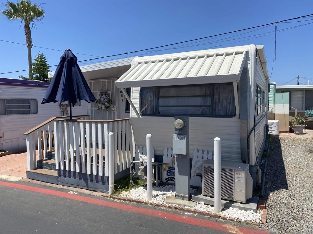 Ready for beach living? You have to see this adorable 1BD/1BA 400 sf remodeled home. Mira Mar is a wonderfule gated 55+ community.Come meet new friends and enjoy the relaxing lifestyle. Walking distance to Oceanside beaches, harbor and downtown activities. Everything you need in a compact space. New A/C split. New ceramic tile flooring. Beautfully decorated and ready for new owner to enjoy. Large paito for relaxing and a huge shed to store your beach toys.