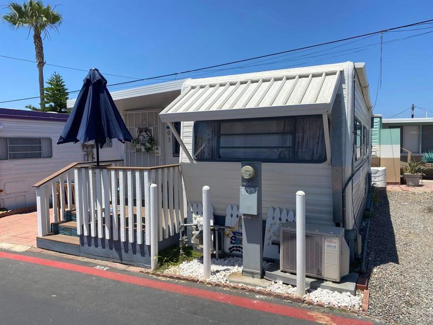 Ready for beach living? You have to see this adorable 1BD/1BA 400 sf remodeled home. Mira Mar is a wonderfule gated 55+ community.Come meet new friends and enjoy the relaxing lifestyle. Walking distance to Oceanside beaches, harbor and downtown activities.  Everything you need in a compact space. New A/C split. New ceramic tile flooring. Beautfully decorated and ready for new owner to enjoy.  Large paito for relaxing and a huge shed to store your beach toys.