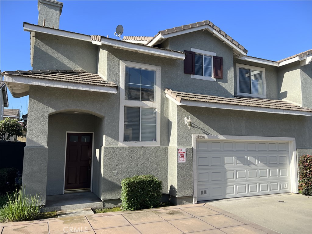 Cozy TURN-KEY Townhome in beautiful Glendora! As you enter you will love the bright natural lighting and laminate flooring found throughout the downstairs. Lots of windows allow for plenty of natural light. The floor plan is open, making the most out of the square footage. A great layout for entertaining. Upstairs you will find spacious bedrooms with mirrored closet doors. The primary bedroom offers a private bathroom and walk-in closet. A second bathroom, coat closet and linen closet on the second floor make for easy access to all your necessities. The property has been freshly painted, has a new range and offers a private back yard great for a summer barbecues. The 2 car attached garage allows easy access and provides a dedicated space for laundry set up. The property is close to schools and shopping with easy freeway access, this house is sure to be called a home quickly!