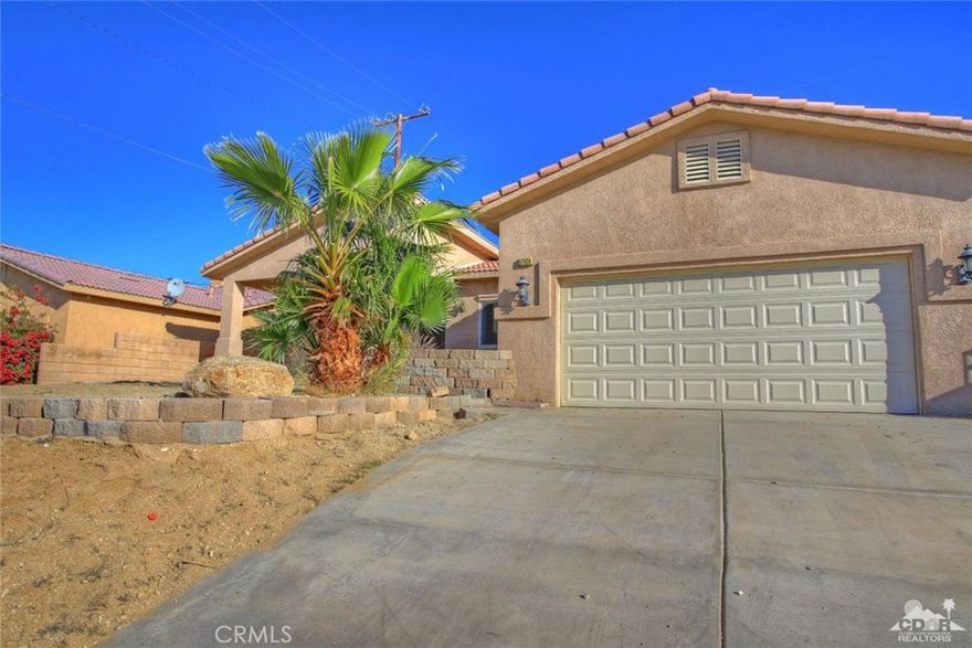 One of the best views in all of Desert Hot Springs! This 3 bed 2 bath 1820 sq ft home has so much to offer. Granite counters and ceramic tile throughout living areas. Brand new carpet and paint inside. Front and back yard are a blank slate awaiting your personal touch. Wonderful patio in backyard perfect for BBQ's and fun. From the front yard is a sweeping view of the entire Coachella Valley! At this price the house won't last long!