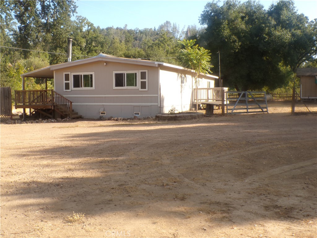 This beautiful ranch is almost 10 acres of flat usable land located close to town. Plenty of room for horses, goats, chickens or any other livestock. If you've been looking for acreage at an affordable price this this could be the perfect spot for you. Highly productive well, fully fenced in with plenty of storage and parking.