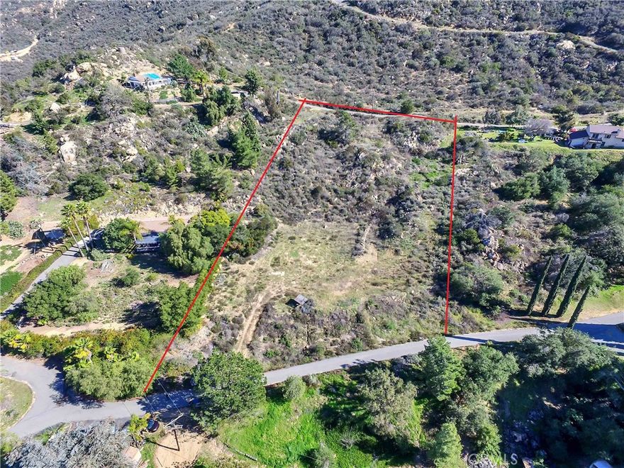 Stunning 2.33-Acre Lot with Panoramic Views – Ready to Build! Nestled among custom homes on a paved road, this exceptional 2.33-acre parcel offers the perfect setting for your dream home. Enjoy breathtaking pastoral views, and on a clear day, catch a glimpse of the Pacific Ocean shimmering in the distance. The location strikes the perfect balance between peaceful rural living and convenient access to key destinations: • I-15 On-ramp – just 3 miles away • Temecula & Award-Winning Wineries – 5 miles • Premier Resorts & Local Gaming – 7 miles • Escondido – 24 miles • San Diego – 53 miles. The owner has invested thousands in completing a PercTest, site plans and Engineer Report for placing a 3 bedroom Manufactured home on the property (reports available for review). The property is well-equipped for development, featuring an installed water meter, electricity approximately 100 feet away, and a fire hydrant within 1,000 feet for added safety. Don’t miss this incredible opportunity to build in a prime location with stunning views. Call today for more details!