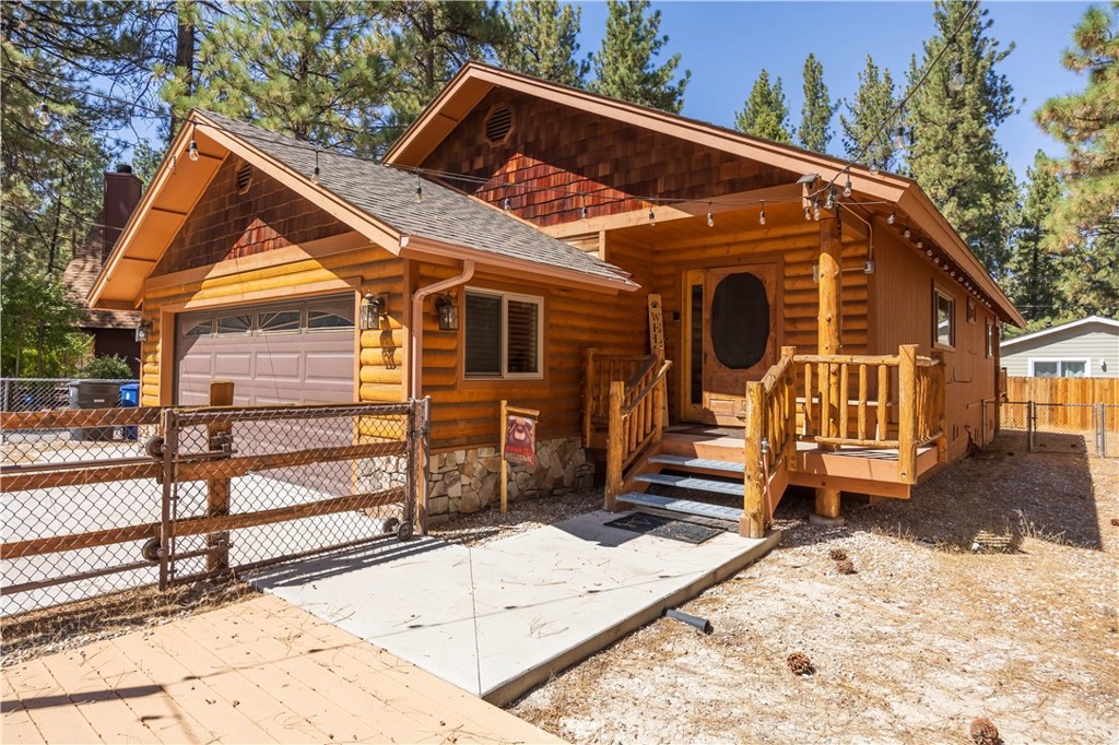 This charming log-sided home offers the perfect blend of mountain charm and modern comfort with vaulted T&G ceilings, skylights, wood laminate floors, and a cozy gas log fireplace that lights with the click of a button. The entertainer’s kitchen features a massive granite island and counters, opening to a spacious floor plan with 3 bedrooms and 2 full baths, including a master suite with oversized walk-in shower and access to the covered rear patio. A two-car attached garage, bonus/playroom, fully fenced yard, covered porches, and easy-care landscaping make it turnkey for full-time living, a weekend retreat, or a lucrative short-term rental. Ideally located within walking distance to Big Bear Snow Play and the famous Oktoberfest at the Convention Center, and just minutes from shopping, dining, skiing, the lake, golf, and year-round community events, this property offers lifestyle enjoyment and strong investment potential all in one.
view video --> http://bit.ly/46qjTaL