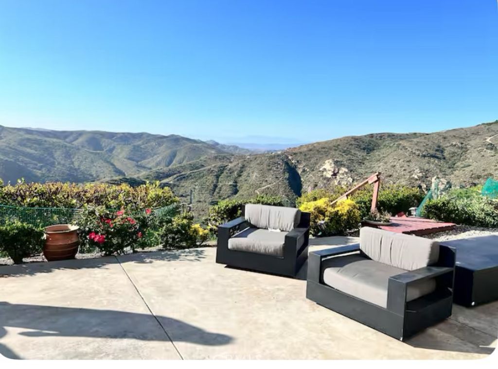 Photo of 1569 Skyline Dr, Laguna Beach, CA 92651 (MLS # OC25239224)