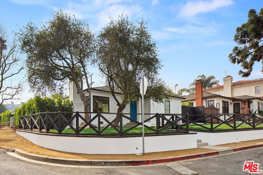 This beautifully updated 3 bed, 2.5 bath modern farmhouse offers comfort, style, and an ideal location in one of Glassell Park's most sought-after pockets, complete with views of the Verdugo Mountains. A charming blue front door sets the tone as you enter a spacious living room with a fireplace, seamlessly connecting to the dining area and kitchen. High ceilings, skylights, and French doors fill the space with natural light and open to a fenced, hardscaped courtyard - perfect for outdoor dining and relaxation. The kitchen features stainless steel appliances, a farm sink, and a convenient breakfast bar. The primary bedroom includes direct access to the courtyard along with an en-suite bathroom appointed with dual sinks and a large walk-in shower. Two additional bedrooms offer flexibility for guests, work-from-home needs, or a private retreat. Well-maintained throughout, the home includes hardwood flooring, central heat & air with Nest thermostats, an in-unit LG washer & dryer, and two off-street parking spots. Just minutes from popular neighborhood favorites like Bub & Grandma's, Dunsmoor, Chfia, Capri Club, and Lemon Poppy Kitchen, with easy access to Highland Park, Eagle Rock, DTLA, and major freeways. A peaceful, modern retreat with all the vibrancy of the city right outside your front door.