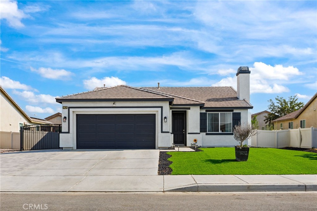 Welcome to this beautifully upgraded and well-maintained single-story home, perfectly situated in a quiet cul-de-sac.
This move-in-ready gem offers 4 bedrooms and 2 bathrooms, making it ideal for both everyday living and entertaining.
Step into a relaxing living room featuring a cozy fireplace, perfect for unwinding after a long day. The home boasts a modern kitchen with a walk-in pantry, newer stainless steel appliances, and updated cabinetry that combines sleek design with functionality.
Both bathrooms have been recently remodeled, featuring new toilets and updated cabinetry and a new master shower. Additional features include ceiling fans throughout, a tankless water heater, double-pane glass doors, and a new AC unit for year-round comfort.
Enjoy the outdoors with professionally landscaped front and backyards, designed for low maintenance and maximum curb appeal. The backyard includes a retaining wall, concrete patio slab, and ample space perfect for family gatherings or peaceful retreats. There’s also a dedicated RV or boat driveway with a clean, modern aesthetic.
The exterior has been recently painted, giving the home a fresh and updated appearance.
Located near Highway 395 and close to shopping centers, this property offers convenience, comfort, and modern style.
Buyer will be required to assume the solar panel purchase agreement and backup battery system, which are reflected in two separate bills.