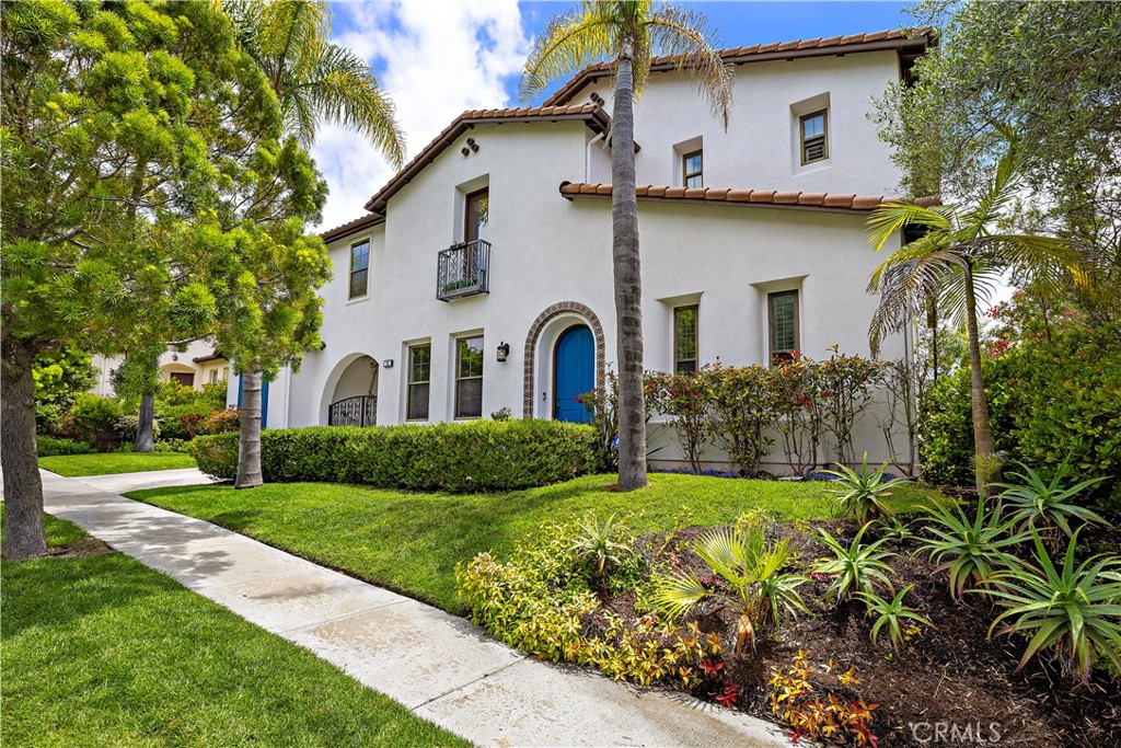End your search for the finest combination of luxury, space and location at this turnkey Talega home in San Clemente. Located in the exclusive Montellano collection from noted builder William Lyon Homes, the large estate-style residence opens to scenic hill, canyon and evening-light views from its elevated homesite of approximately 9,875 square feet. With no one directly behind or below, the panoramic vistas are unobstructed and enjoyed from indoor and outdoor spaces. Across the street from a tranquil greenbelt, the home presents a refined presence with Spanish Colonial Revival architecture, manicured landscaping, and a gated porte cochere leading to a motorcourt and courtyard garden. Approximately 4,766 square feet, the impressive two-story floorplan offers generous room to live, prosper and grow. Enjoy five ensuite bedrooms, including one on the main level that opens to the backyard, five- and one-half baths, a first-level office with built-in desk, and a second-floor loft with romantic Juliet balcony. Entertain fireside in the formal living room, then adjourn to the formal dining room for memorable times with the special people in your life. A butler’s pantry with wine refrigerator and dishwasher connects the dining room to a grand-scale kitchen with island, white cabinetry, nook with bay window, built-in desk, granite countertops with full backsplash, and a walk-in pantry. Top-tier KitchenAid appliances include a built-in refrigerator, double oven and six-burner cooktop with dramatic hood. Warmed by a fireplace with raised hearth, the view-enhanced family room elevates movie nights to blockbuster status with built-in surround sound, while the split three-car garage hosts built-in storage and epoxy flooring. Second-level bedrooms are separated from the primary suite, which is appointed with a two-door entrance with art niches, an ample walk-in closet with furniture-caliber built-ins, two view balconies, a sitting area with fireplace, and a sumptuous bath with jetted tub, separate shower, individual vanities and custom stone tile. Preferred upgrades include wood and Spanish tile flooring, paneled solid-core interior doors, custom lighting and window treatments, crown molding, mirrored wardrobe doors, in-ceiling speakers, a Ring camera at the front door, solar power, and a Beam Serenity Plus central vacuum system. Close to Talega’s golf course, Swim & Athletic Club and trails, Montellano is enviably located near shopping, parks and award-winning schools.