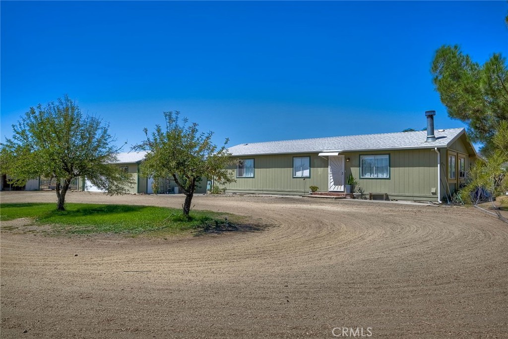 Equestrian Dream Property in Aguanga's Lake Riverside Estates!
Welcome to this beautiful country home on 3.1 acres of usable fenced property— a rare opportunity to own an idyllic equestrian homestead nestled on 3.1 usable, fully fenced acres in the highly desirable Lake Riverside Estates community. This charming home offers just over 2,000 sq ft of well-designed living space, including a private mother-in-law suite perfect for guests or extended family.
Inside, you’ll find an open-concept layout with vaulted ceilings, a spacious and sunlit kitchen with abundant counter space, and a great room that boasts breathtaking views of Cahuilla Mountain through an oversized picture window. Step outside to your private backyard oasis featuring a large patio with sliding panel glass doors, a relaxing spa, and a tranquil garden area — perfect for entertaining or soaking in the serenity.
Equestrian lovers, take note: the barn is a true showstopper! This beautifully maintained facility includes a 4-stall motel with wash rack and tack/vet room. The property also features multiple hitching posts, turnouts with shelters, dedicated tack areas, and three well-designed arenas — ideal for training, events, or casual riding. There’s also a large livestock area with an enclosed chicken coop, and direct gated access to scenic creekside riding trails at the bottom of the lot.
Need room for projects or toys? The oversized 800+ sq ft garage provides plenty of space for storage, hobbies, or vehicles.
Located in the gated Lake Riverside Estates community, residents enjoy access to a private airstrip, 55-acre lake with fishing, pool, playgrounds, BBQ areas, security patrol, and miles of equestrian trails.
Don’t miss this one-of-a-kind opportunity to live the equestrian lifestyle you’ve always dreamed of — all within a peaceful, gated community in Aguanga.