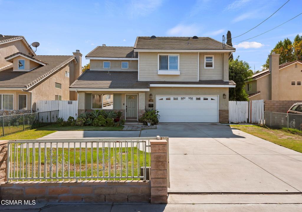 Welcome to this Canoga Park home, built in 2002, featuring 5 bedrooms, 4 bathrooms, and 2,721 square feet of comfortable living space. This property offers a perfect blend of modern efficiency and timeless appeal, with plenty of space to grow.As you step inside, high vaulted ceilings, smooth textured finishes, and crown molding set a welcoming tone. This property has two living rooms, built for an entertaining and comfortable space. The home comes equipped with dual-pane windows, and an owned solar panel system, helping to reduce energy costs. Recessed lighting further enhances the space, creating a cozy atmosphere for everyday living and entertaining alike. The home encompasses tile and wood-like flooring throughout. There is no carpet in this home!The spacious kitchen offers ample cabinetry and counter space, with direct access to the large backyard. The well designed second living room has a cozy fireplace and is a great space to relax while entertaining. With one bedroom and full bathroom downstairs, it provides convenience for any and all guests. All bedrooms are generously sized, and come with their own bathrooms. A jack and jill bathroom connects two guest bedrooms upstairs. The primary suite provides ample space and storage, with vaulted ceilings, and two walk-in closets. In addition, the primary ensuite bathroom includes an oversized soaking tub and dual vanity.This home comes with plenty of front parking with an expandable parking lot gate, which ensures home safety and protects up to 8 cars in addition to a two car garage. The private backyard has extra shed storage, a lemon tree, and provides space for outdoor relaxation and activities.