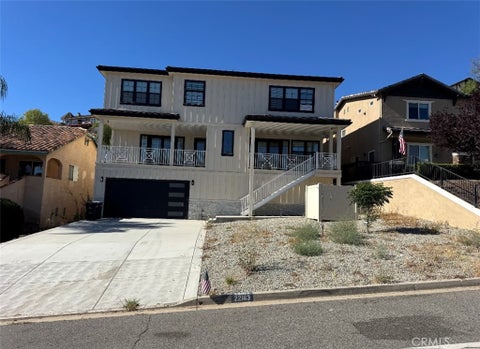 Photo of 22163 Vacation Drive, Canyon Lake, CA 92587 (MLS # SW26154617)