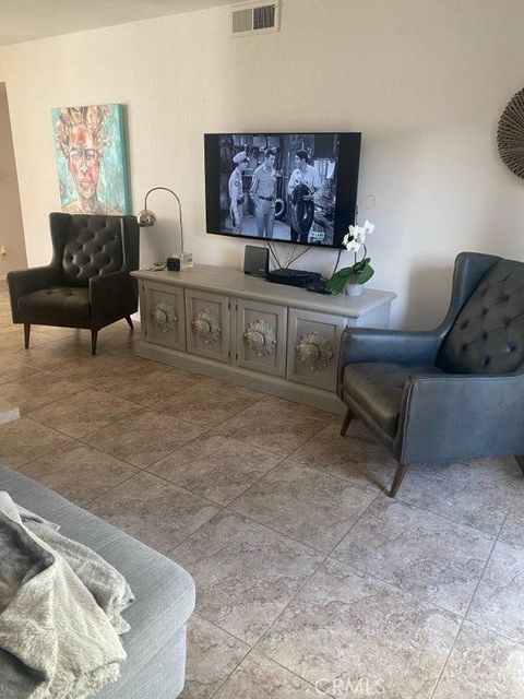 Photo of 48828 Desert Flower Dr, Palm Desert, CA 92260 (MLS # TR26072526)
