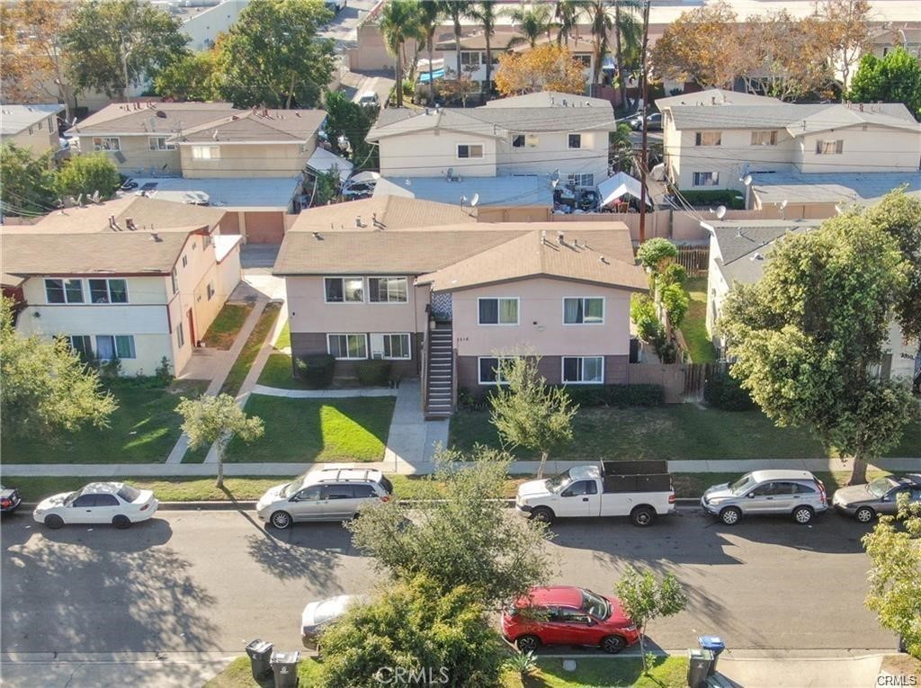 Bread and butter property to hold long term. Excellent investment. It is 1 building structure with 2 units up and 2 units down. all 4 units are identical and in excellent conditions. New mini-split AC systems for each unit. 4 single garages and 3 parking spots. SouthCoast Metro area, convenient to all central OC amenities