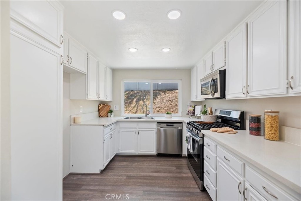 Welcome to 1326 Rosehill Drive — a single-story gem tucked into one of Riverside’s most sought-after neighborhoods.
Located on a quiet cul-de-sac in Canyon Crest, this charming home offers 3 spacious bedrooms, 2 full bathrooms, and a well-designed 1,455 sq ft layout on a generous 9,000+ sq ft lot.
From the moment you arrive, you’re greeted with great curb appeal—lush green lawn, mature palms, and a peaceful neighborhood feel. Inside, you’ll find vaulted ceilings and large windows that flood the space with natural light. The inviting living room features a cozy fireplace and flows effortlessly into the backyard, creating the perfect setting for entertaining or winding down at the end of the day.
The kitchen offers ample counter space and storage, with an adjacent dining area ideal for both casual meals and weekend brunch. The primary suite is a true retreat, complete with private backyard access, French doors, a dedicated vanity area, and an en-suite bathroom. Two additional bedrooms offer generous closet space and plush carpeting, while the second full bath includes a tub-shower combo for added convenience.
Outside, the backyard is full of potential—whether you’re dreaming of a garden oasis, a family play space, a sparkling pool, or your own personal retreat, this expansive lot offers endless possibilities to create your ideal outdoor escape.
Located just minutes from UCR, Canyon Crest Towne Centre, golf courses, parks, top-rated schools, and scenic hiking trails. Plus, you’re just a short drive from major freeways, making commuting and weekend adventures easy.
Whether you’re upsizing, downsizing, buying your first home, or looking for a smart investment opportunity near UC Riverside—this is a move-in ready gem in one of Riverside’s most established communities.