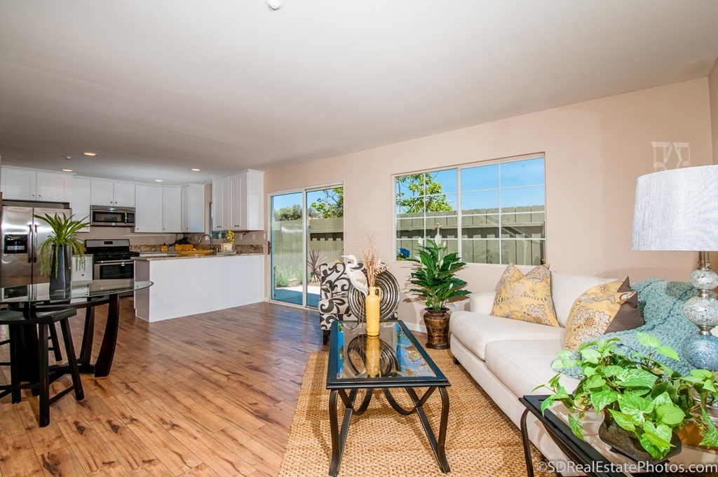 Beautiful & Eloquently remodeled! So Cal Living at its finest! Fantastic Engineered hardwood flooring, granite counter tops, designer white kitchen and bathroom cabinetry, dazzling bathrooms with custom tile, in-unit laundry and cool air conditioning. This home features relaxing master bedroom views, a spacious open floor plan, large 2 car garage and a large fenced-in patio area. All in a delightfully quite and private complex. Where else can you get so much for the price! 5 already sold....hurry... Neighborhoods: Spring Valley Equipment: Garage Door Opener, Range/Oven Other Fees: 0 Sewer: Sewer Connected Topography: LL
