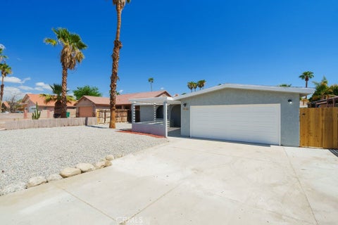 Photo of 31120 Date Palm DR, Cathedral City, CA 92234 (MLS # CV26203825)